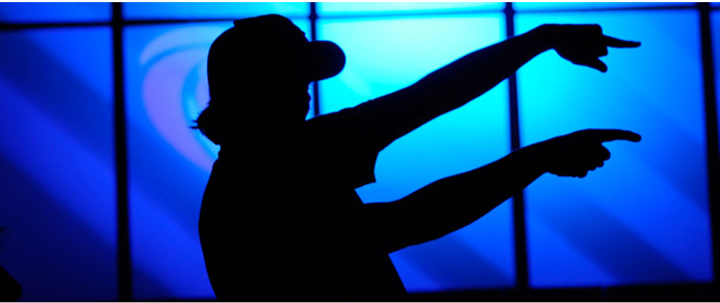 what´s next image, shadow oil trader making hand gestures